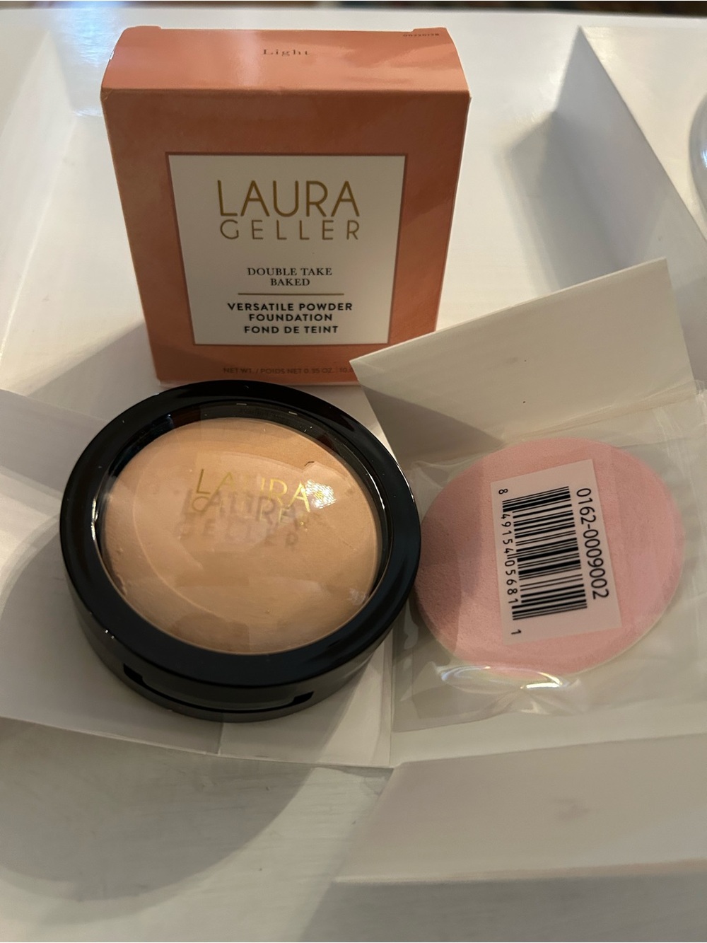 NIB Laura Geller Double Take Baked powder/foundation, Light